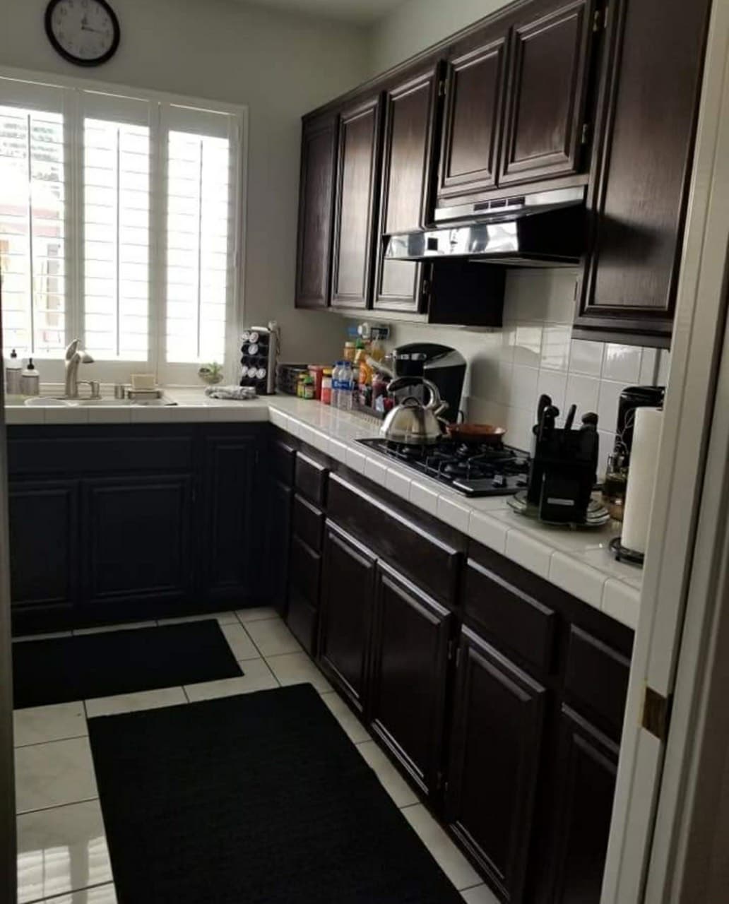 picture of a newly remodeled kitchen with new brown countertops and cabinets